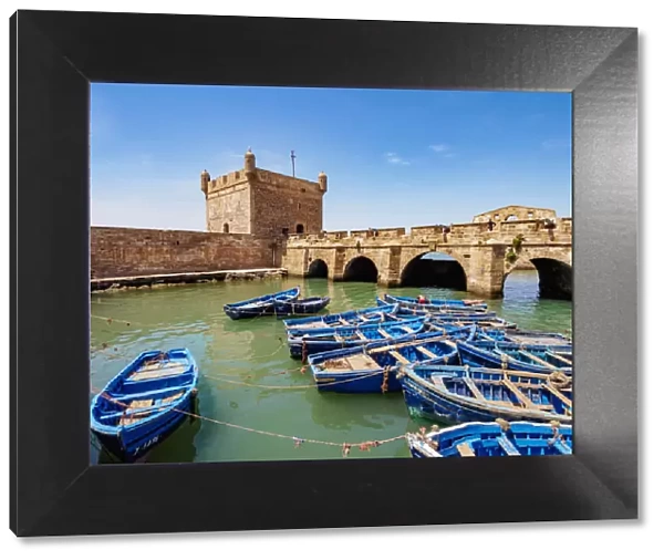 Blue boats in the Scala Harbour and the Citadel, Essaouira, Marrakesh-Safi Region