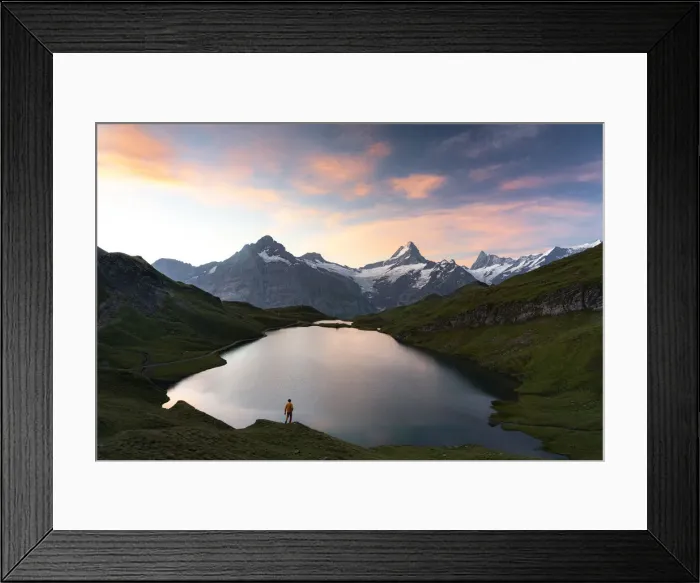 Framed Print : Hiker admiring sunrise from the shores of Bachalpsee lake, Grindelwald, Bernese Oberland Framed Print : Hiker admiring sunrise from the shores of Bachalpsee lake, Grindelwald, Bernese Oberland