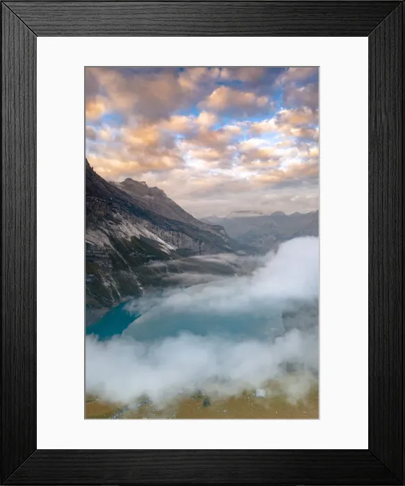 Framed Print : Clouds at sunset over the pristine lake Oeschinensee in the mist, Bernese Oberland Framed Print : Clouds at sunset over the pristine lake Oeschinensee in the mist, Bernese Oberland