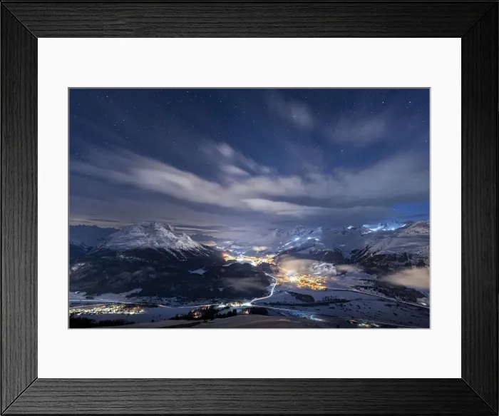 Framed Print : Starry winter sky over St. Moritz village and Upper Engadine covered with snow viewed Framed Print : Starry winter sky over St. Moritz village and Upper Engadine covered with snow viewed