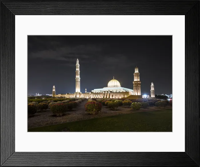 Framed Print : Night view of Sultan Qaboos Mosque illuminated and the oleander field in the foreground Framed Print : Night view of Sultan Qaboos Mosque illuminated and the oleander field in the foreground