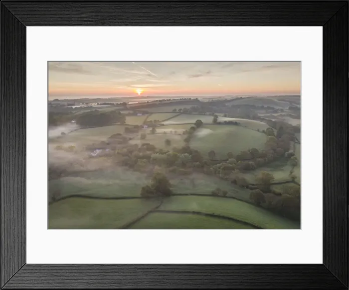 Framed Print : Misty spring sunrise over rolling countryside, South Tawton, Devon, England Framed Print : Misty spring sunrise over rolling countryside, South Tawton, Devon, England