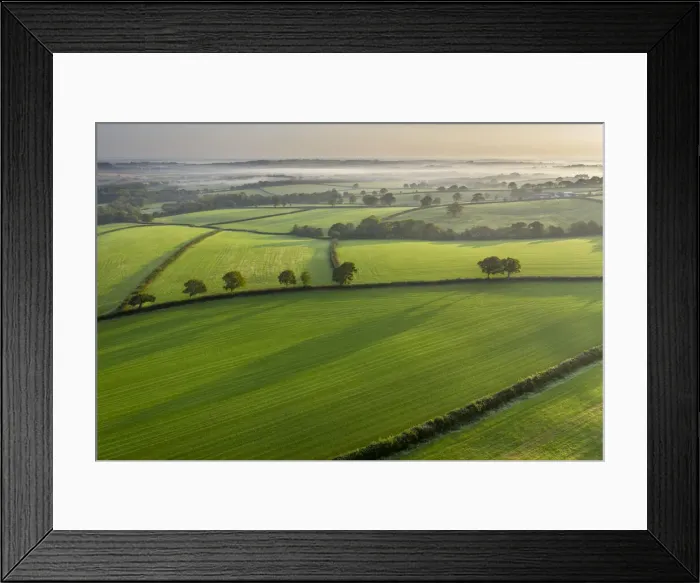 Framed Print : Aerial vista of rolling Devon countryside near Spreyton in autumn, Devon, England Framed Print : Aerial vista of rolling Devon countryside near Spreyton in autumn, Devon, England