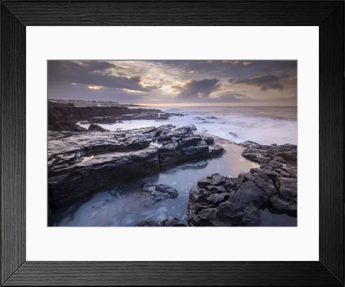 Framed Print : Sunrise over the dramatic rocky coastline of Porthcawl in winter, South Wales Framed Print : Sunrise over the dramatic rocky coastline of Porthcawl in winter, South Wales