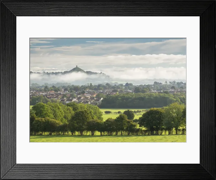 Framed Print : View across the town of Street towards Glastonbury Tor on a misty autumn morning Framed Print : View across the town of Street towards Glastonbury Tor on a misty autumn morning