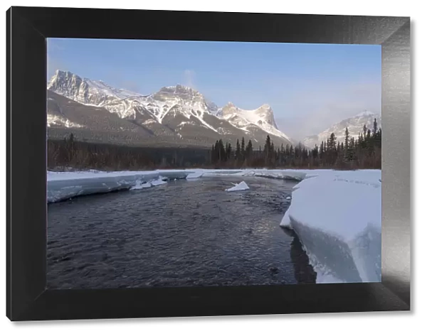 Policemans Creek in winter with Ha Ling Peak at sunrise, Bow Valley Provincial Park