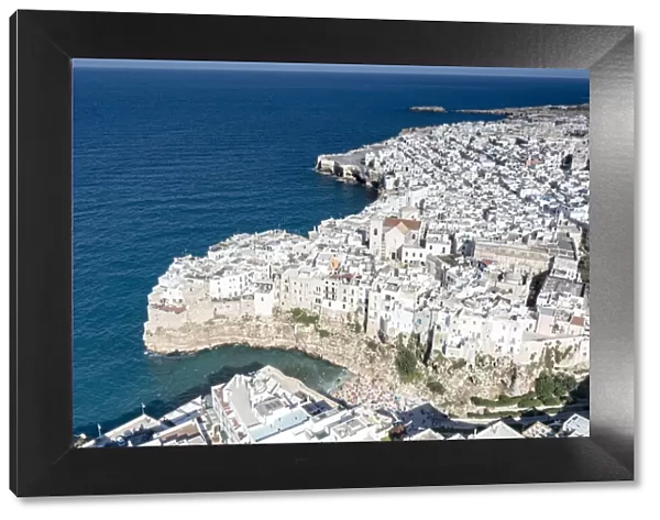 Aerial view of the sea town Polignano a Mare perched on cliffs, province of Bari, Apulia