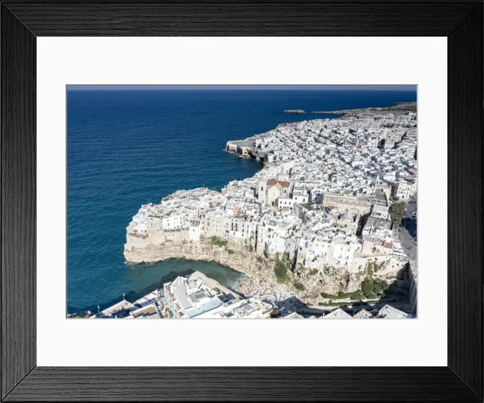 Framed Print : Aerial view of the sea town Polignano a Mare perched on cliffs, province of Bari, Apulia Framed Print : Aerial view of the sea town Polignano a Mare perched on cliffs, province of Bari, Apulia