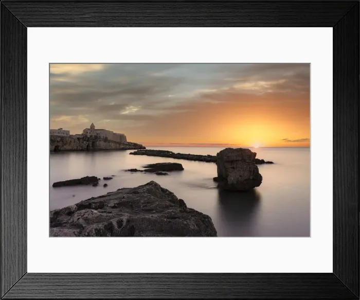 Framed Print : Clouds at sunrise over the calm sea surrounding Vieste, Foggia province Framed Print : Clouds at sunrise over the calm sea surrounding Vieste, Foggia province