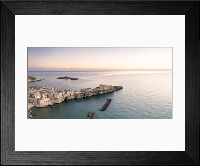 Framed Print : Aerial view of old town and lighthouse of Vieste at dawn, Foggia province Framed Print : Aerial view of old town and lighthouse of Vieste at dawn, Foggia province