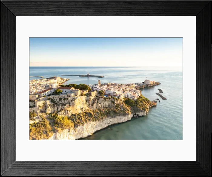 Framed Print : Old town of Vieste perched on cliffs at sunrise, aerial view, Foggia province Framed Print : Old town of Vieste perched on cliffs at sunrise, aerial view, Foggia province