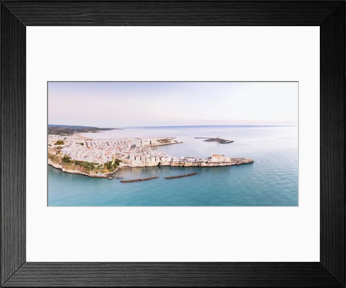 Framed Print : Aerial view of the white buildings of Vieste at sunrise, Foggia province Framed Print : Aerial view of the white buildings of Vieste at sunrise, Foggia province