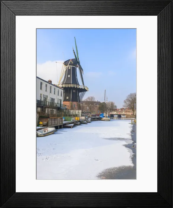 Framed Print : Windmill De Adriaan along the frozen canal of Spaarne river, Haarlem, Amsterdam district Framed Print : Windmill De Adriaan along the frozen canal of Spaarne river, Haarlem, Amsterdam district