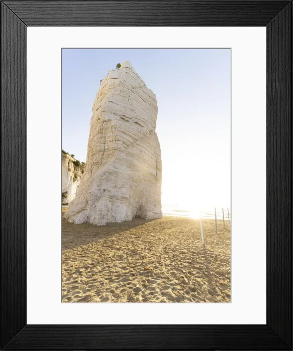Framed Print : Towering white rock monolith Pizzomunno at sunrise, Vieste, Foggia province