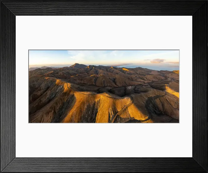 Framed Print : Empty road crossing the barren mountains of Pajara at dawn from Sicasumbre observatory Framed Print : Empty road crossing the barren mountains of Pajara at dawn from Sicasumbre observatory