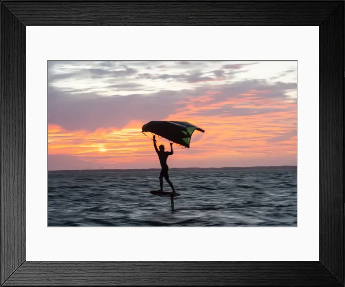 Framed Print : Pro surfer James Jenkins on his wing surfer flies across the Pamlico Sound at Nags Head Framed Print : Pro surfer James Jenkins on his wing surfer flies across the Pamlico Sound at Nags Head
