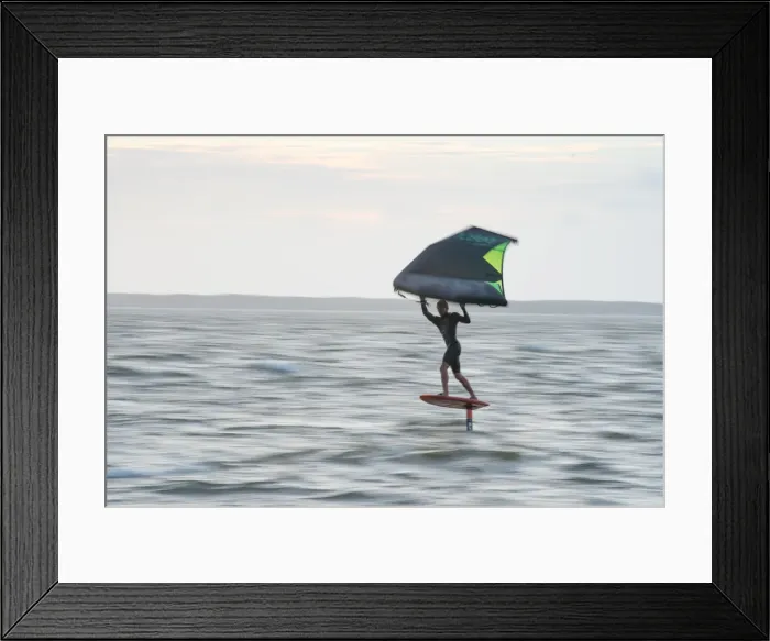 Framed Print : Pro surfer James Jenkins flies above the Atlantic Ocean on his wing surfer at Nags Head Framed Print : Pro surfer James Jenkins flies above the Atlantic Ocean on his wing surfer at Nags Head