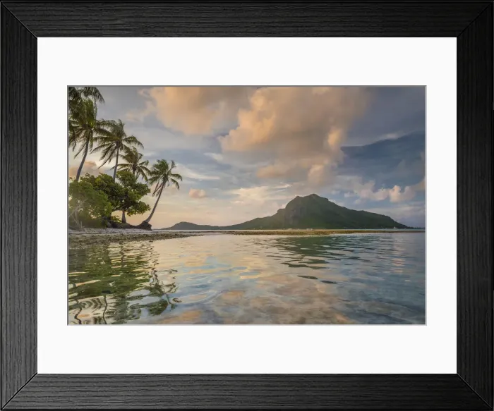 Framed Print : A calm evening in the lagoon of Bora Bora as a cloud forms on top of the mountain Framed Print : A calm evening in the lagoon of Bora Bora as a cloud forms on top of the mountain