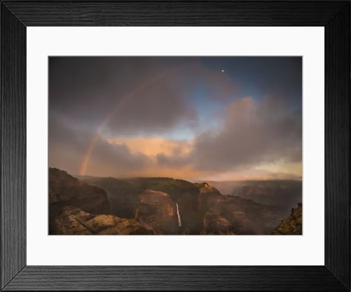 Framed Print : Sunset rainbow arches over the Waimea Canyon and Waipo o Falls towards the moon Framed Print : Sunset rainbow arches over the Waimea Canyon and Waipo o Falls towards the moon