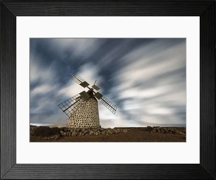 Framed Print : Clouds in the starry sky over a traditional windmill, La Oliva, Fuerteventura Framed Print : Clouds in the starry sky over a traditional windmill, La Oliva, Fuerteventura