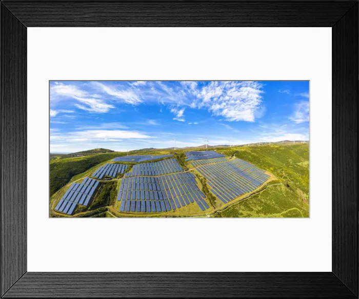 Framed Print : Solar panels and wind turbines on the green plateau, Encumeada, Madeira island, Portugal Framed Print : Solar panels and wind turbines on the green plateau, Encumeada, Madeira island, Portugal