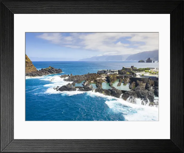 Framed Print : Natural pools formed by volcanic lava filled with crystal-clear sea water, Porto Moniz Framed Print : Natural pools formed by volcanic lava filled with crystal-clear sea water, Porto Moniz