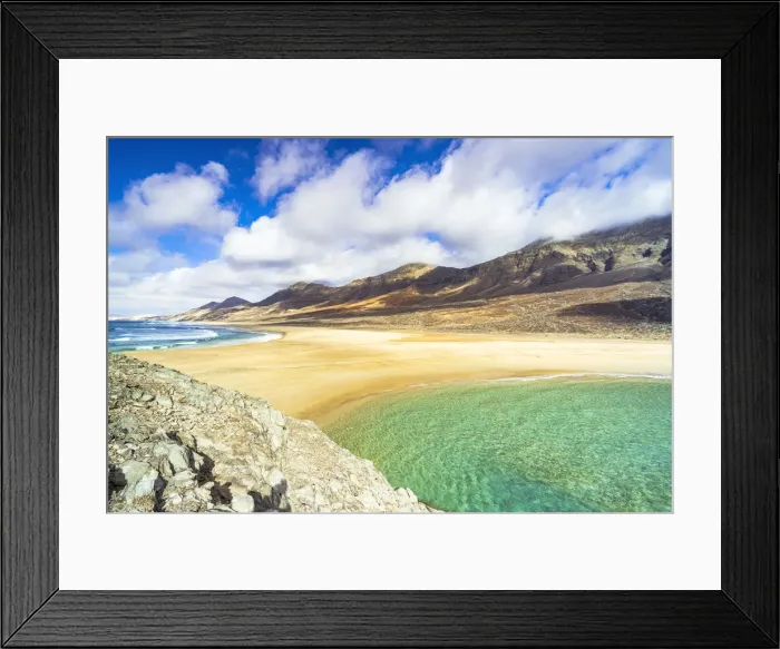 Framed Print : Both sides of crystal ocean viewed from El Islote islet, Cofete beach, Jandia peninsula Framed Print : Both sides of crystal ocean viewed from El Islote islet, Cofete beach, Jandia peninsula
