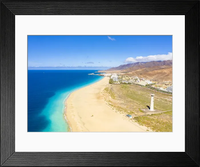 Framed Print : Aerial view of fine sand beach and lighthouse, Morro Jable, Fuerteventura, Canary Islands Framed Print : Aerial view of fine sand beach and lighthouse, Morro Jable, Fuerteventura, Canary Islands