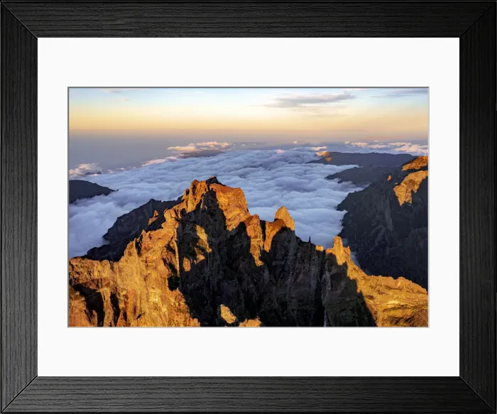 Framed Print : Clouds surrounding the rocky peak of Pico das Torres lit by sunset, Madeira island Framed Print : Clouds surrounding the rocky peak of Pico das Torres lit by sunset, Madeira island