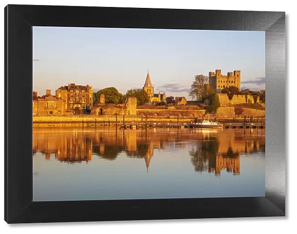 View across the River Medway to Rochester Castle and Cathedral at sunset, Rochester, Kent