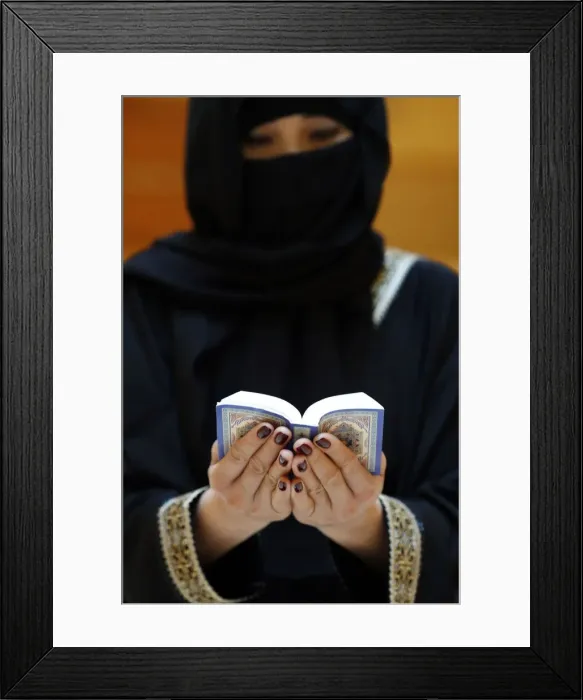 Framed Print : Muslim woman reading the Noble Quran, United Arab Emirates, Middle East Framed Print : Muslim woman reading the Noble Quran, United Arab Emirates, Middle East