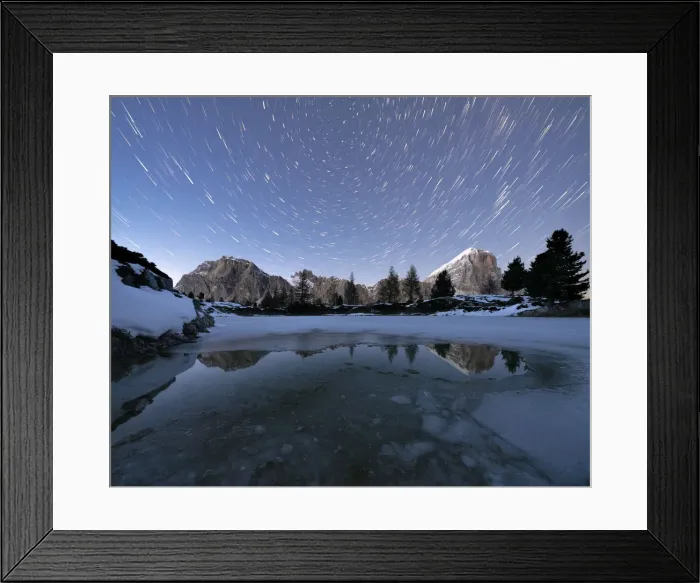 Framed Print : Polar star trail in the night sky over Lagazuoi and Tofana di Rozes peaks from frozen Framed Print : Polar star trail in the night sky over Lagazuoi and Tofana di Rozes peaks from frozen