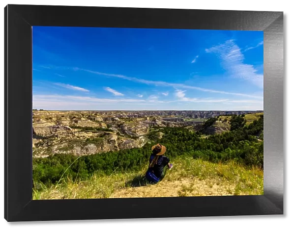 Woman enjoying the view along the Theodore Roosevelt National Park North Unit