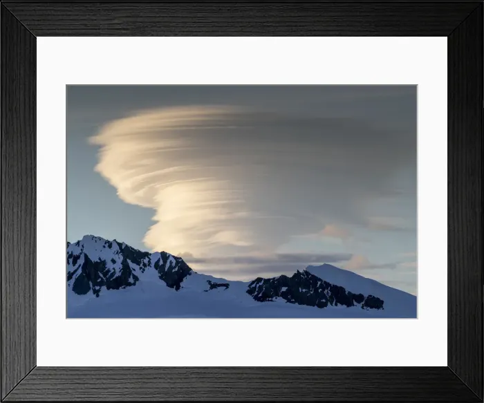 Framed Print : Shorefast ice and snow covered mountains with a lenticular cloud build up in Wilhamena Framed Print : Shorefast ice and snow covered mountains with a lenticular cloud build up in Wilhamena