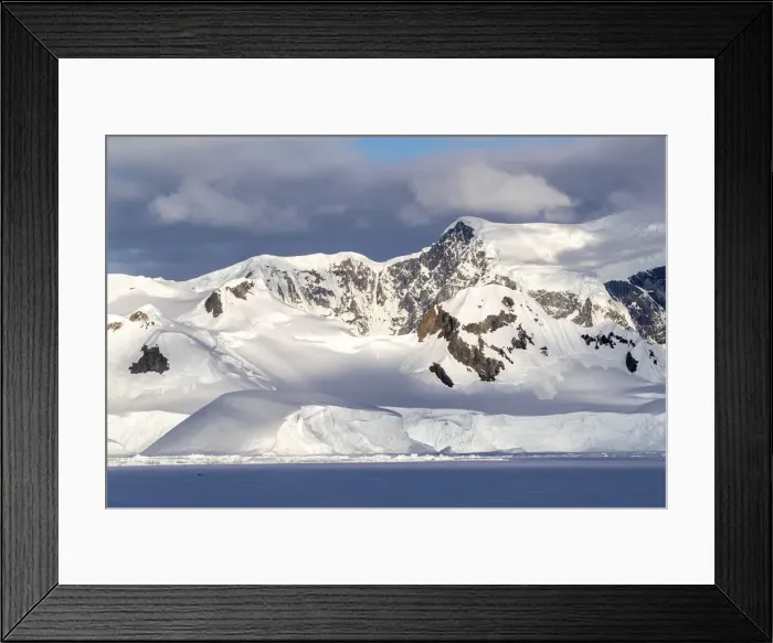 Framed Print : Shorefast ice and snow covered mountains in early season in Wilhamena Bay, Antarctica Framed Print : Shorefast ice and snow covered mountains in early season in Wilhamena Bay, Antarctica