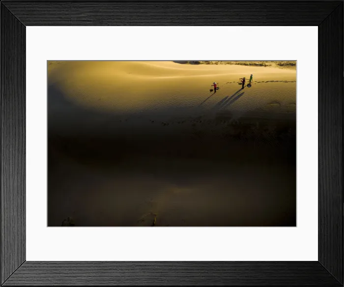 Framed Print : People walking home across Nam Cuong sand dunes, Ninh Thuan, Vietnam, Indochina Framed Print : People walking home across Nam Cuong sand dunes, Ninh Thuan, Vietnam, Indochina