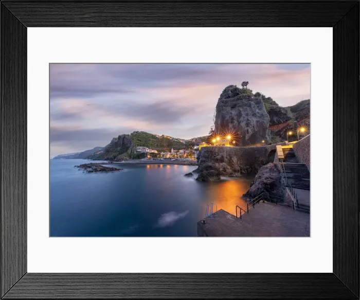 Framed Print : Dusk lights over the seaside town resort of Ponta do Sol washed by the ocean Framed Print : Dusk lights over the seaside town resort of Ponta do Sol washed by the ocean