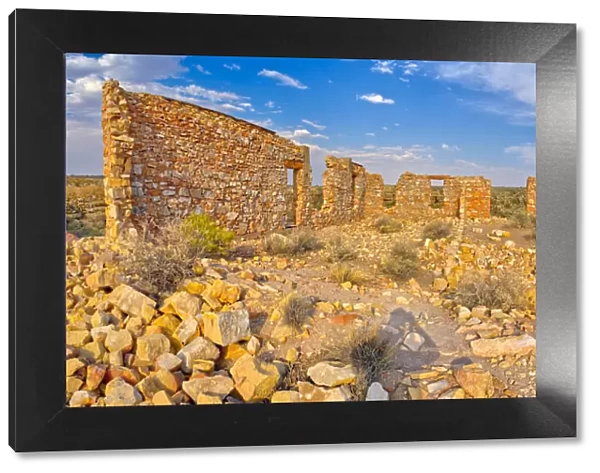 The crumbling stone walls of a derelict building in the ghost town of Two Guns, Arizona