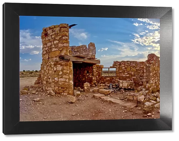 The ghostly remains of an old stone tower in the ghost town of Two Guns, Arizona