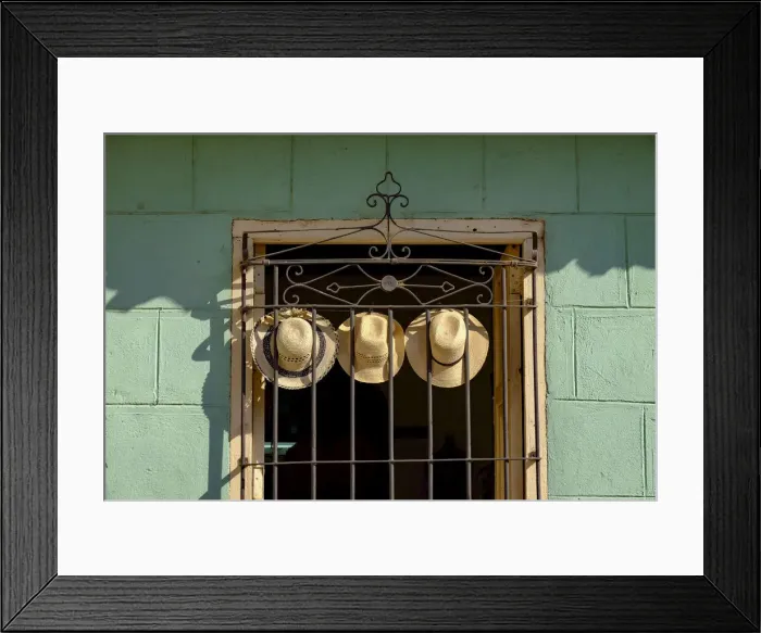 Framed Print : Three straw hats hang on an iron grate in a window, Trinidad, Cuba, West Indies Framed Print : Three straw hats hang on an iron grate in a window, Trinidad, Cuba, West Indies