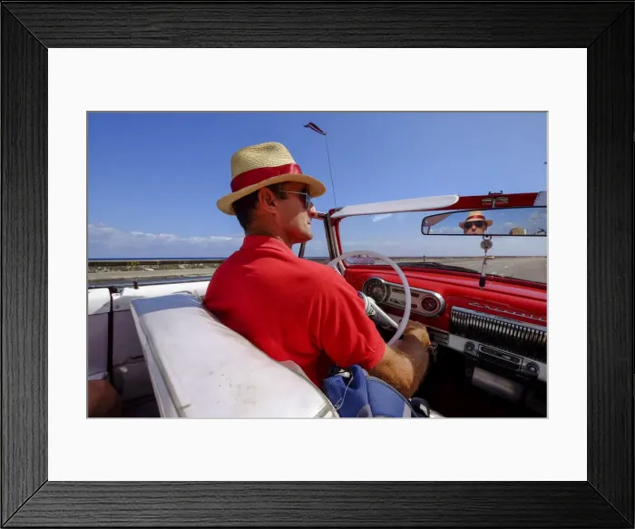 Framed Print : Man in straw hat drives vintage car along the Malecon, Havana, Cuba, West Indies Framed Print : Man in straw hat drives vintage car along the Malecon, Havana, Cuba, West Indies