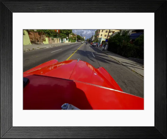Framed Print : The hood of a vintage car driving the streets of Havana, Havana, Cuba, West Indies Framed Print : The hood of a vintage car driving the streets of Havana, Havana, Cuba, West Indies