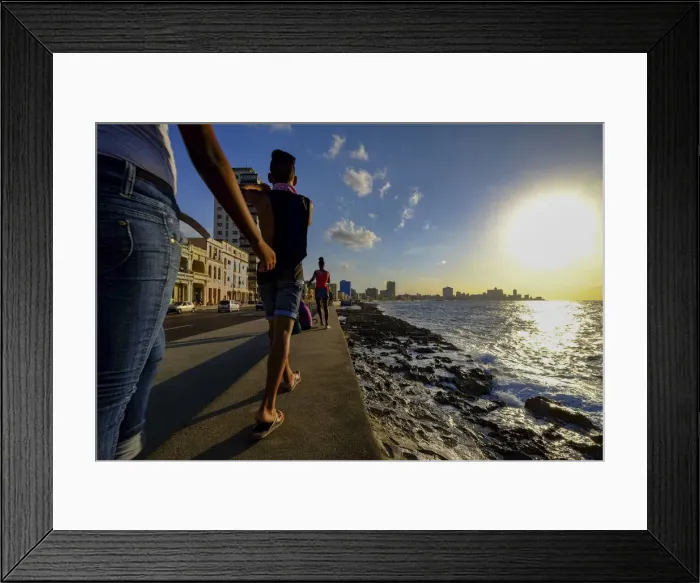 Framed Print : People walk along the Malecon as the sun sets, Havana, Cuba, West Indies, Central America Framed Print : People walk along the Malecon as the sun sets, Havana, Cuba, West Indies, Central America