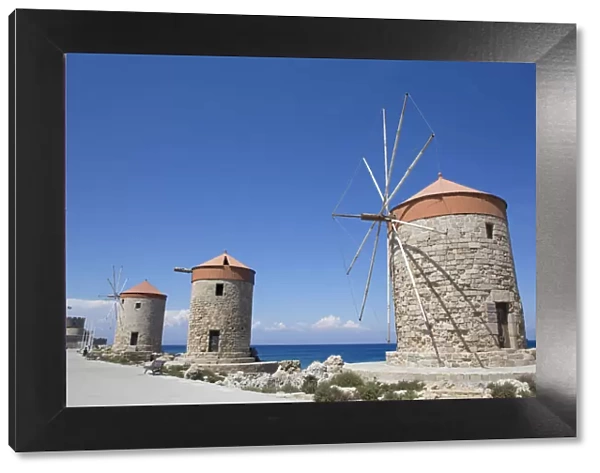 Windmills of Mandraki, Fort of St. Nicholas in the background, Mandraki Harbour, Rhodes