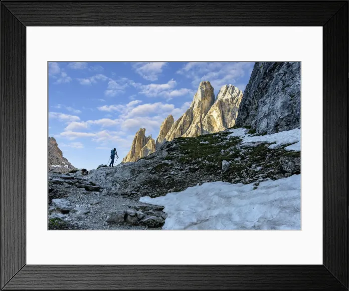 Framed Print : Hiker woman walking on path to majestic Croda Dei Toni mountain at dawn, Val Fiscalina Framed Print : Hiker woman walking on path to majestic Croda Dei Toni mountain at dawn, Val Fiscalina