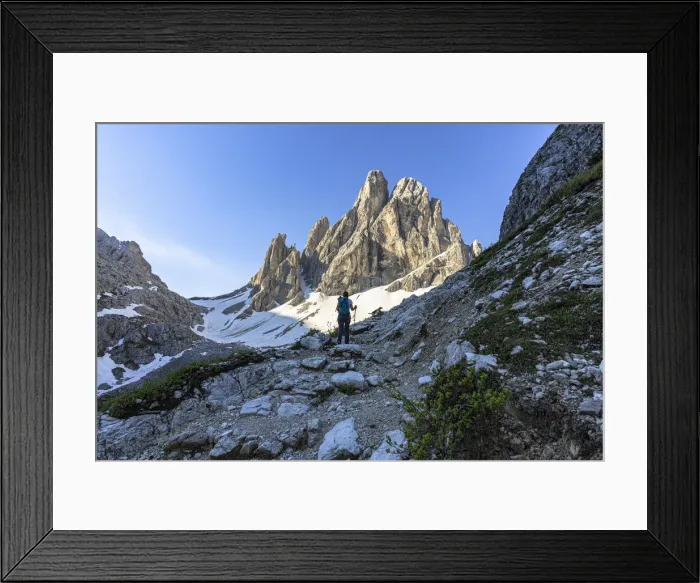 Framed Print : Hiker woman with backpack walking on path to Croda Dei Toni at sunrise, Val Fiscalina Framed Print : Hiker woman with backpack walking on path to Croda Dei Toni at sunrise, Val Fiscalina
