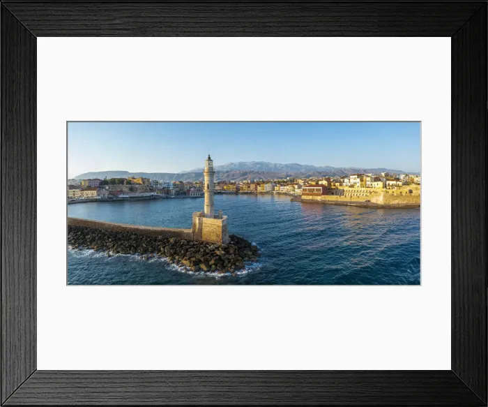 Framed Print : Aerial view of lighthouse and harbour of Chania old town at sunrise, island of Crete Framed Print : Aerial view of lighthouse and harbour of Chania old town at sunrise, island of Crete