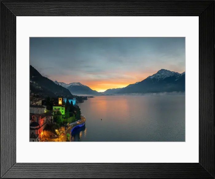 Framed Print : Christmas lights decorating the old bell tower and houses in Gravedona during sunrise Framed Print : Christmas lights decorating the old bell tower and houses in Gravedona during sunrise