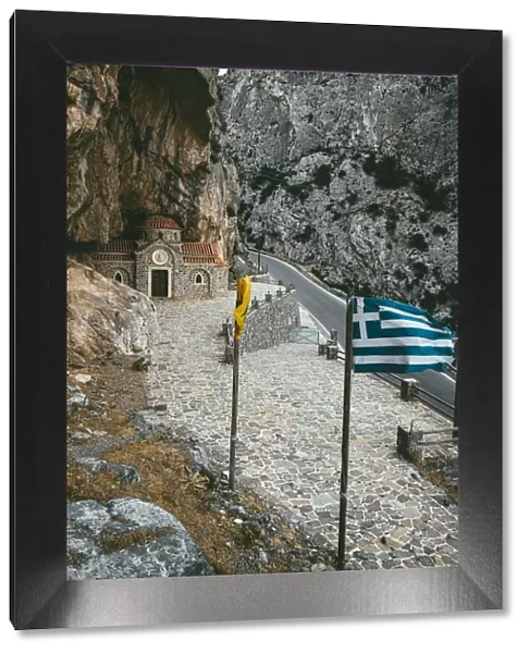 Narrow road crossing Kotsifou gorge nearby the old Agios Nikolaos chapel built in rocks