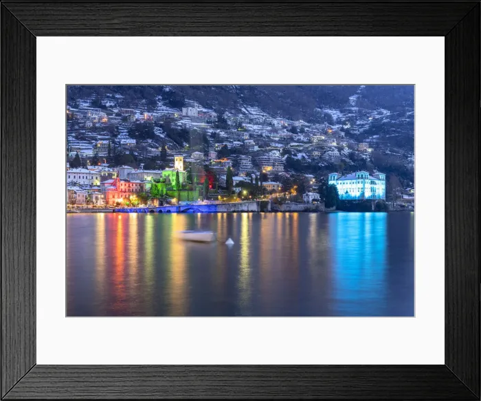 Framed Print : Fairy tale village of Gravedona illuminated with Christmas Lights during a snowy winter Framed Print : Fairy tale village of Gravedona illuminated with Christmas Lights during a snowy winter